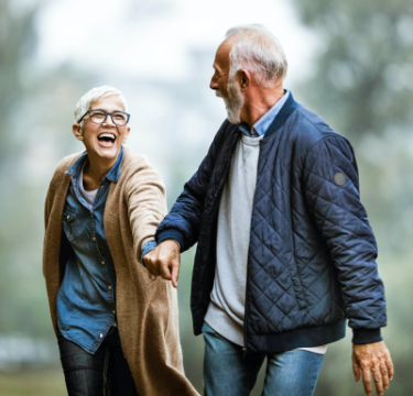 two seniors enjoying a walk around our community