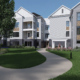 Outdoor image showing walking paths and buildings of The Halstead's future community.
