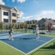 a rendering of the on-site pickleball courts wiith residents playing games