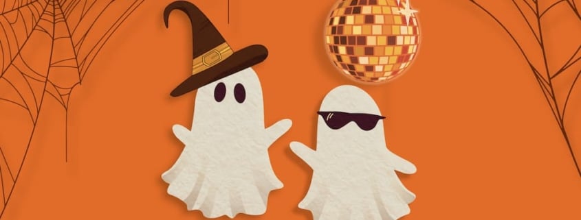 Graphic of two ghosts with a witch hat and sunglasses posing under an orange disco ball and cobwebs.